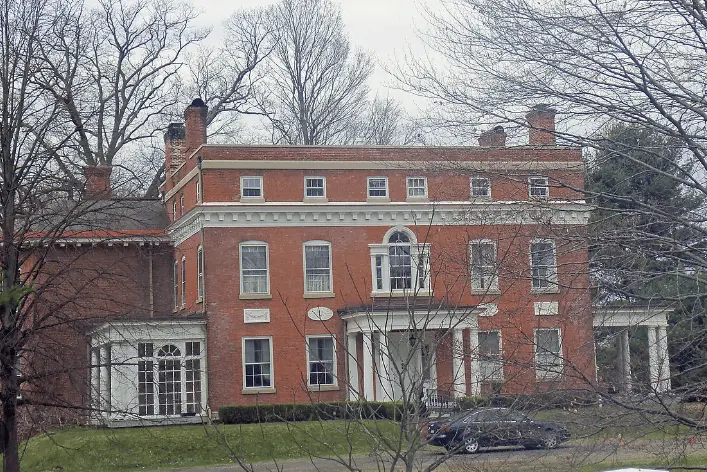 Flat Roof with Red Brick House